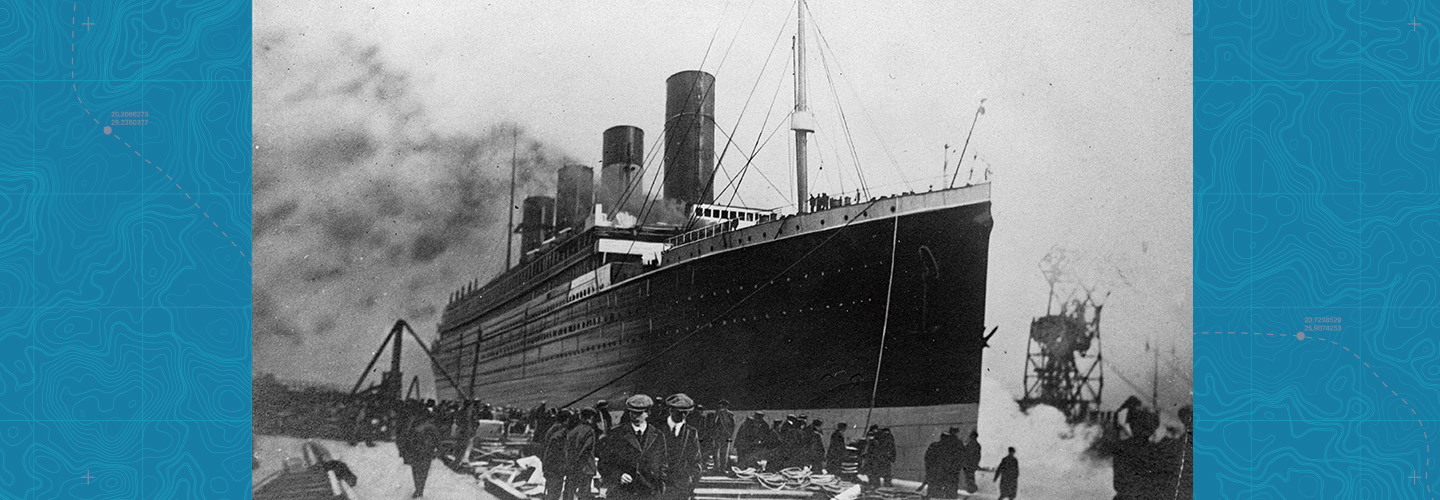 Black & white photo of people boarding the Titanic