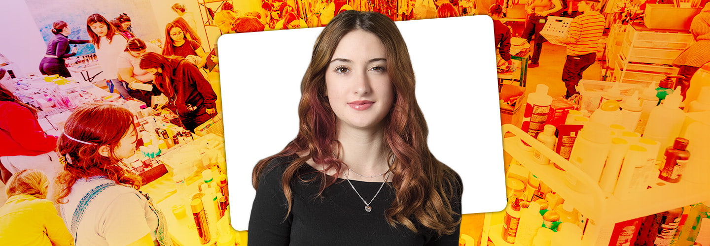 Image of a person against backdrop of a busy retail store