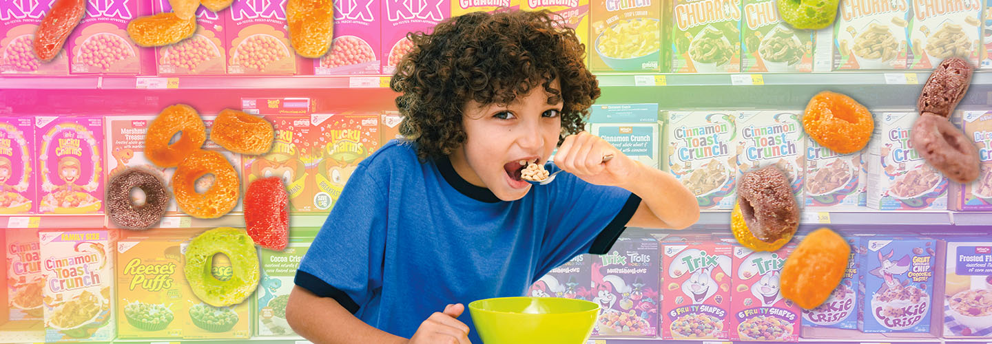 Image of a kid eating a bowl of cereal against backdrop of cereal boxes