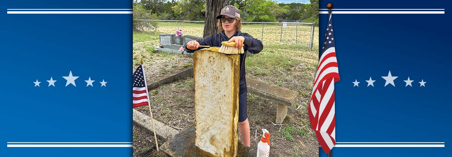Image of teen cleaning a veteran&apos;s grave